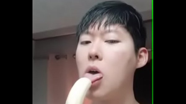 my korean dog sucking on his favorite fruit
